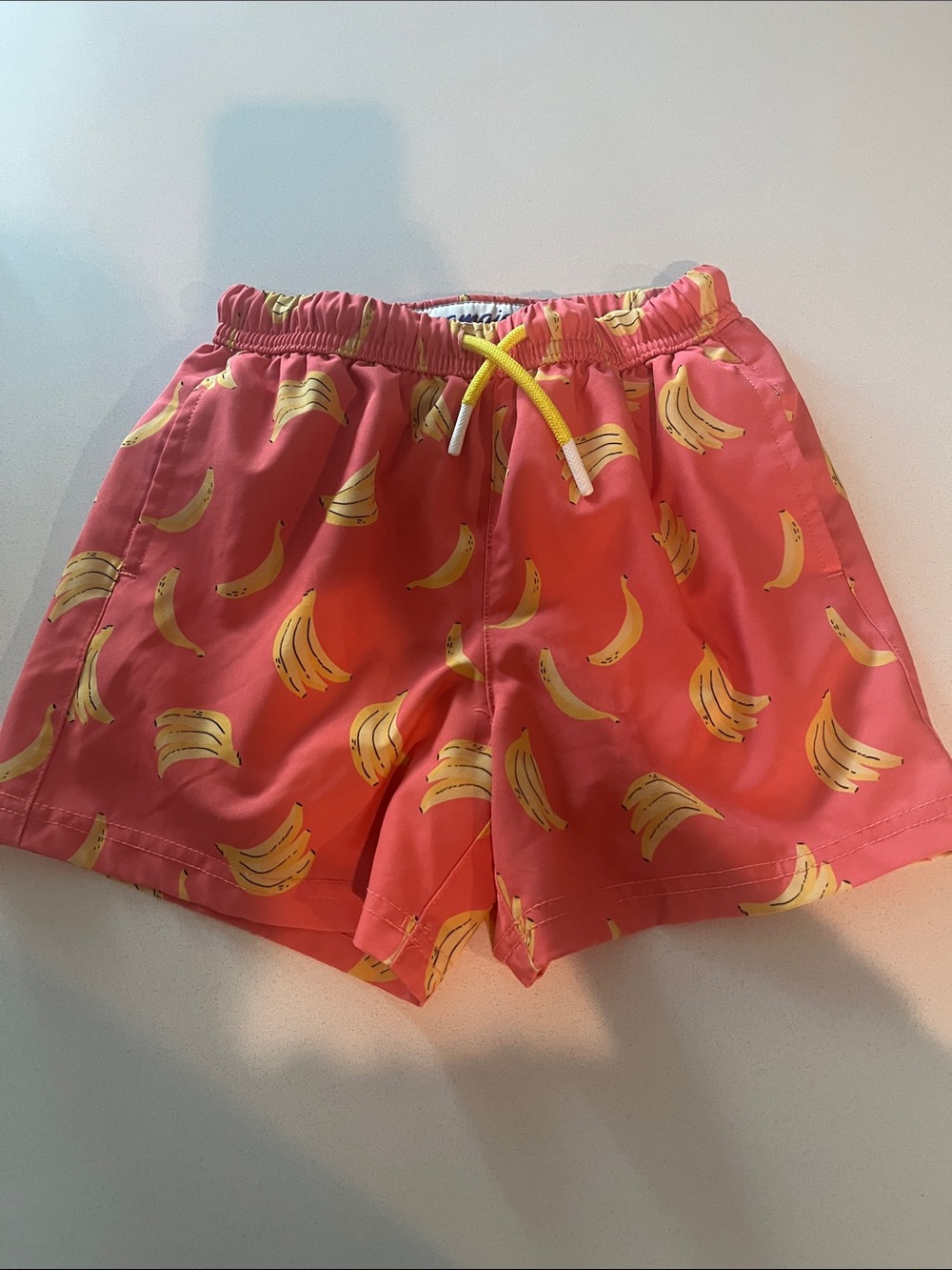 Kids Pink Banana-Print Swim Shorts with Yellow Drawstring